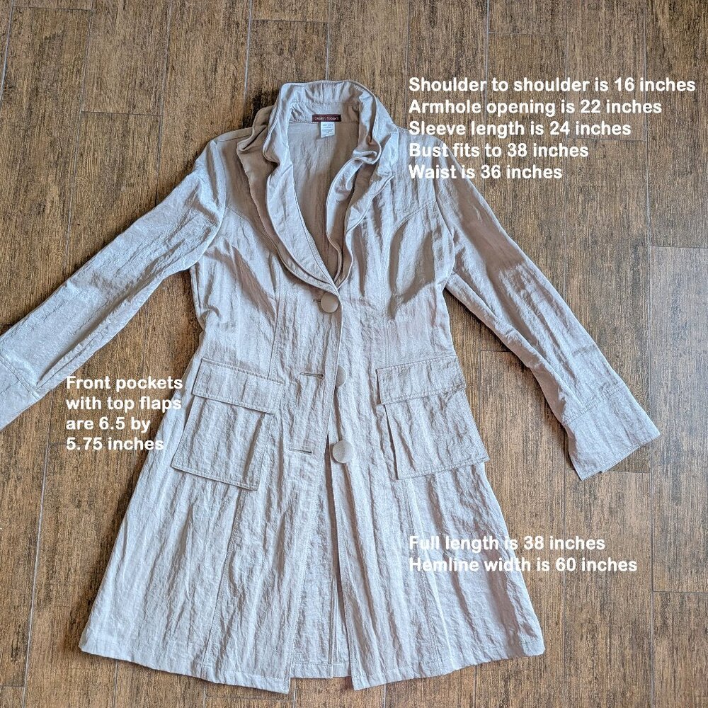 Design Today's beige Nylon button front raincoat, Wire ruffle trim dual collar